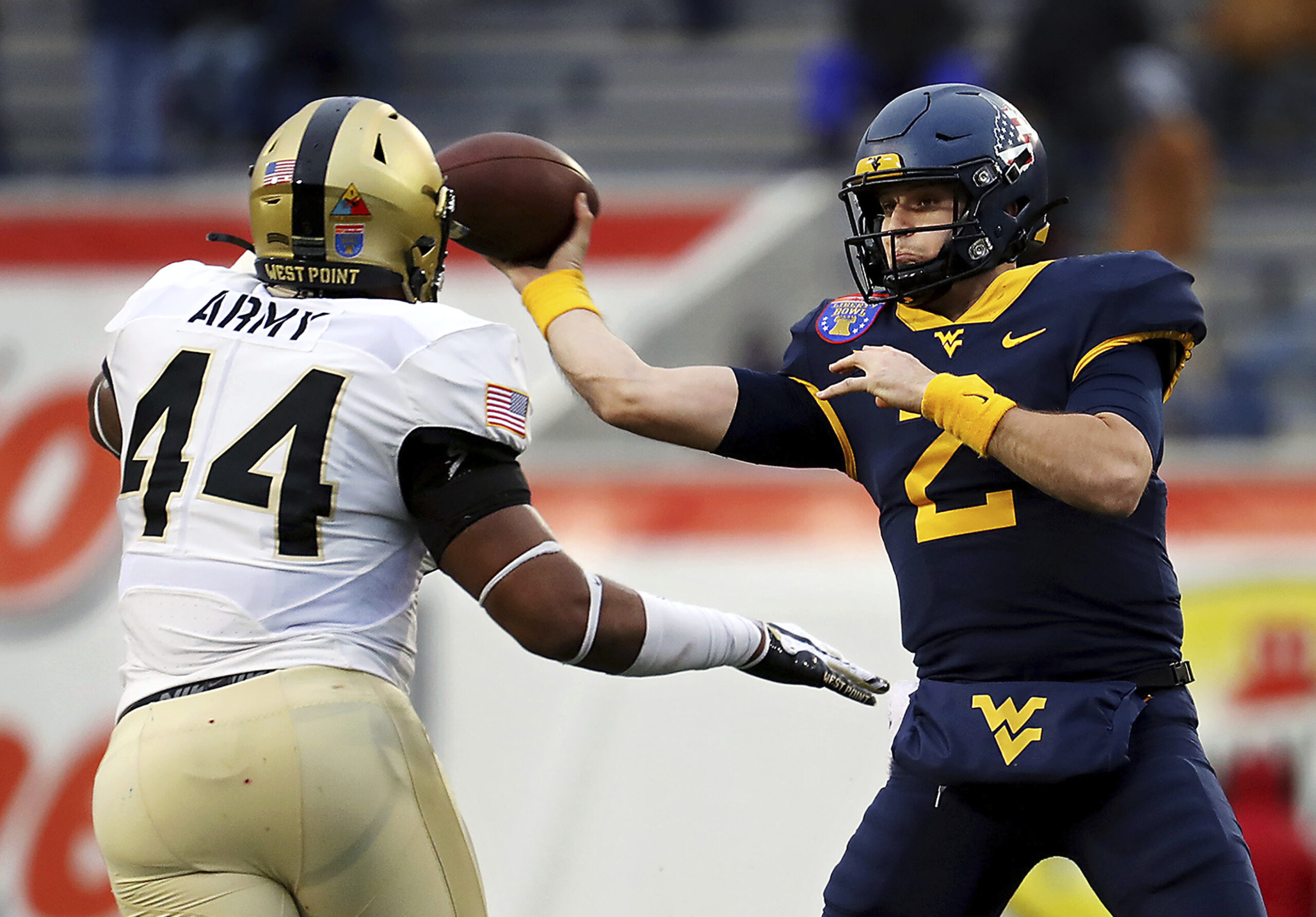 West Virginia rallies to beat Army 24-21 in Liberty Bowl